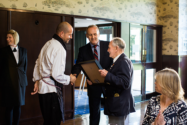 john dennett presents gift to andrew kitchen southwick house